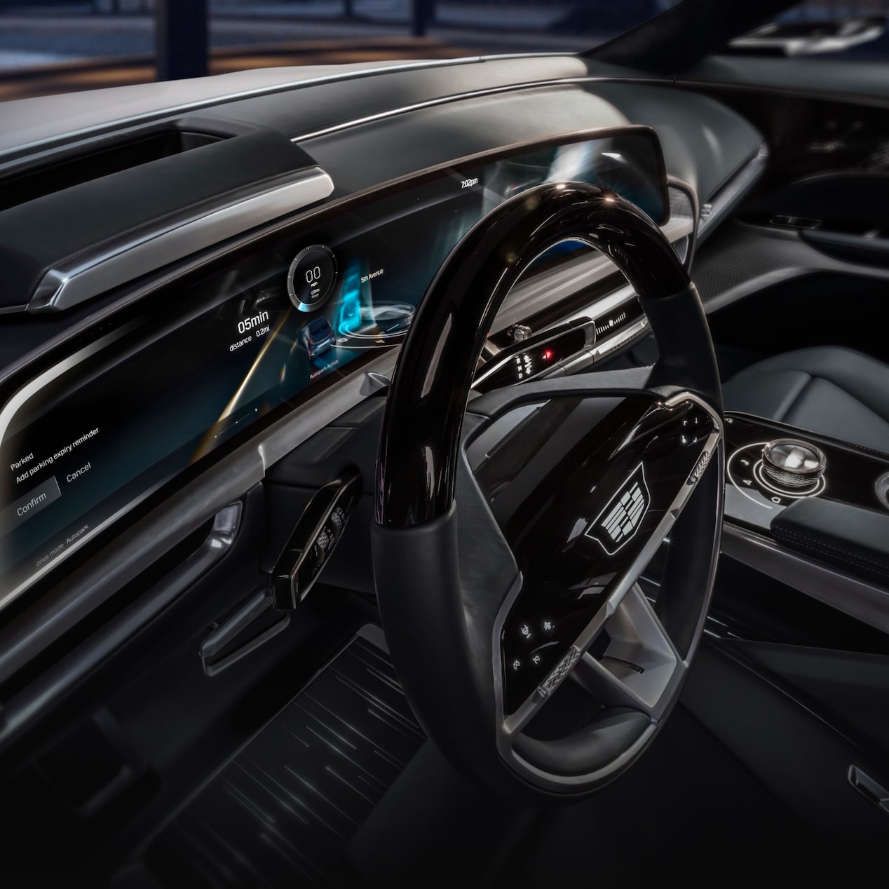 Interior suntuoso do Cadillac Lyriq, com destaque para seu painel e seu volante com tecnologia de ponta. 