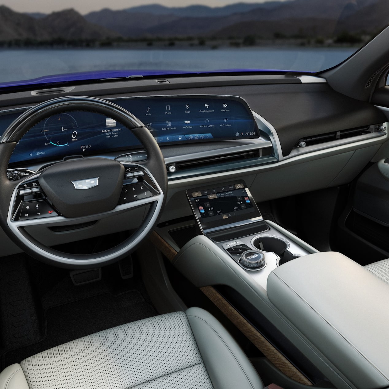 Visão frontal interna do painel, volante e central multimídia do Cadillac Vistiq